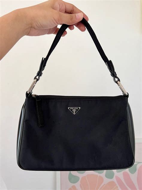 prada baguette vintage marrone|farfetch prada bags.